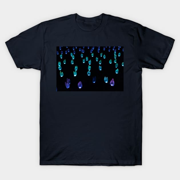 Glowing glass tulips at night T-Shirt by AlexK